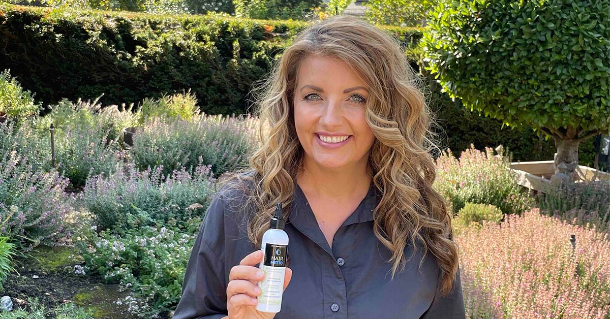 Andrea Kuipers co founder of HAIRMETTO holding natural serum to treat and prevent hair loss.